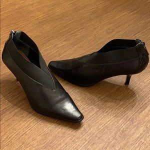 Black booties with zipper back.